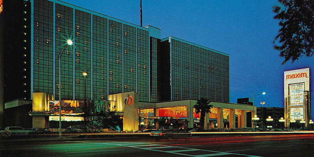 The Maxim Hotel and Casino on Flamingo Road at dusk in 1977 with its sign lit